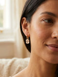 Octavia Crystal Huggie Earrings in Bright Gold